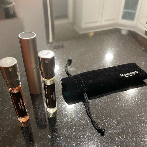 Scent bird 2 perfumes, atomizer, & pouch. Can sell them individually. $10 each - Picture 1 of 5